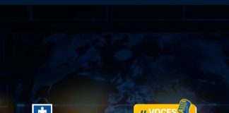 Tras la huella digital: El trabajo de un investigador de ciberdelitos En la portada de redes sociales de la sección Voces Fiscalía se ve una fotografía de fondo de una persona de espaldas observando varias pantallas de computador con datos, encimas de las pantallas se ve un mundo y un titular que dice: Tras la huella digital: El trabajo de un investigador de ciberdelitos.