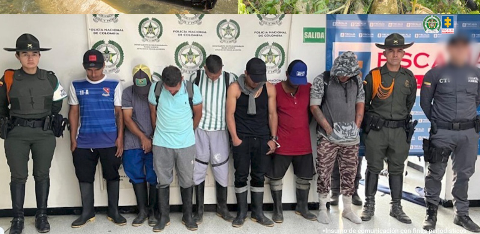 Se observan siete personas capturadas, en fila, de frente, custodiadas a ambos lados por servidores de Policía Nacional y en uno de ellos por otro funcionario , servidor del CTI Risaralda. Al fondo se observa un pendón de la Fiscalía General de la Nación y otro de Policía Nacional